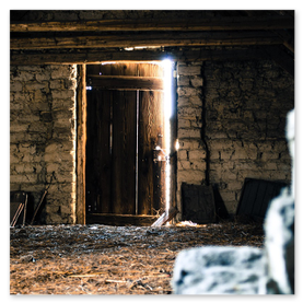 Dormitorio en buhardilla con cama a medida